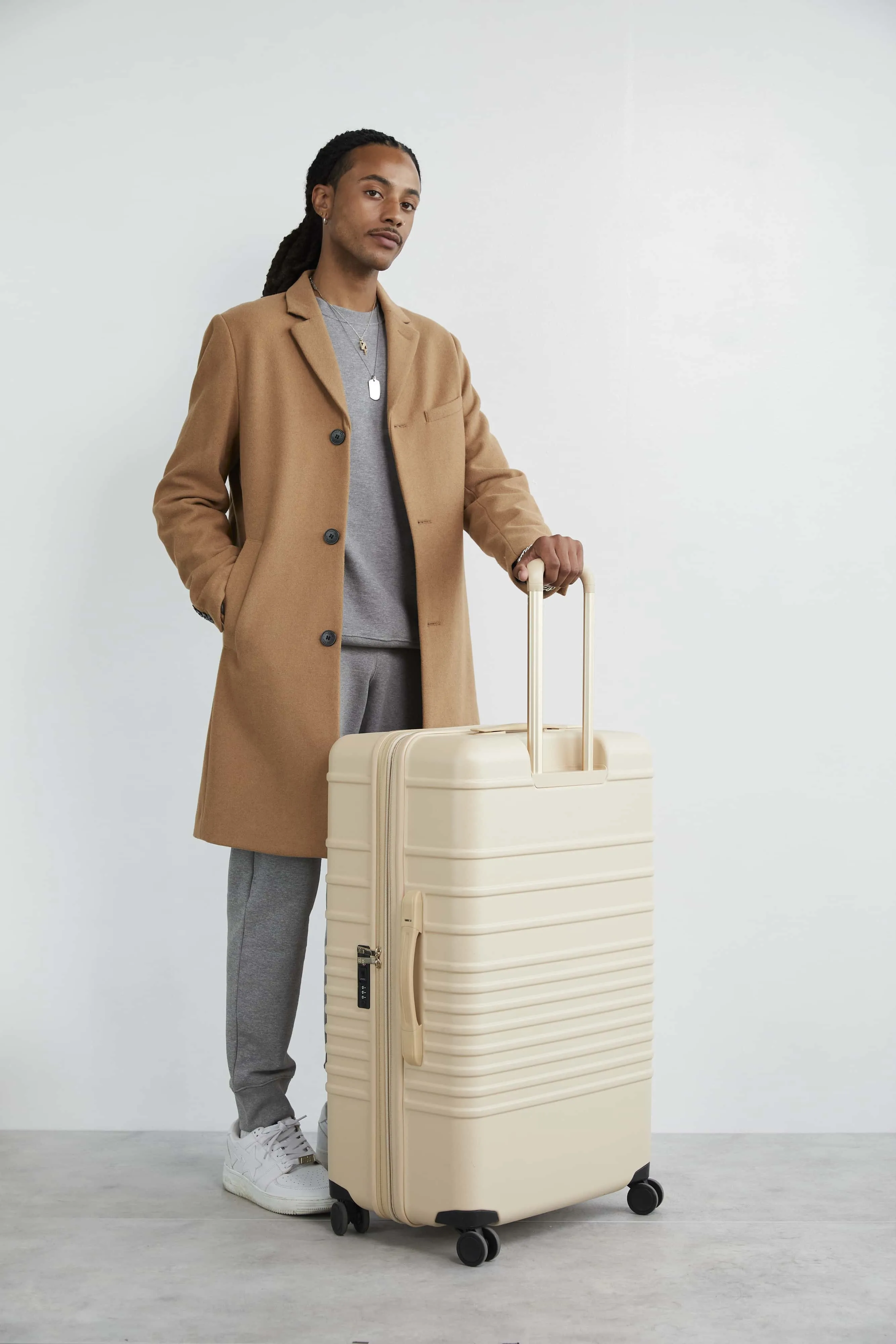 The Large Check-In Roller in Beige
